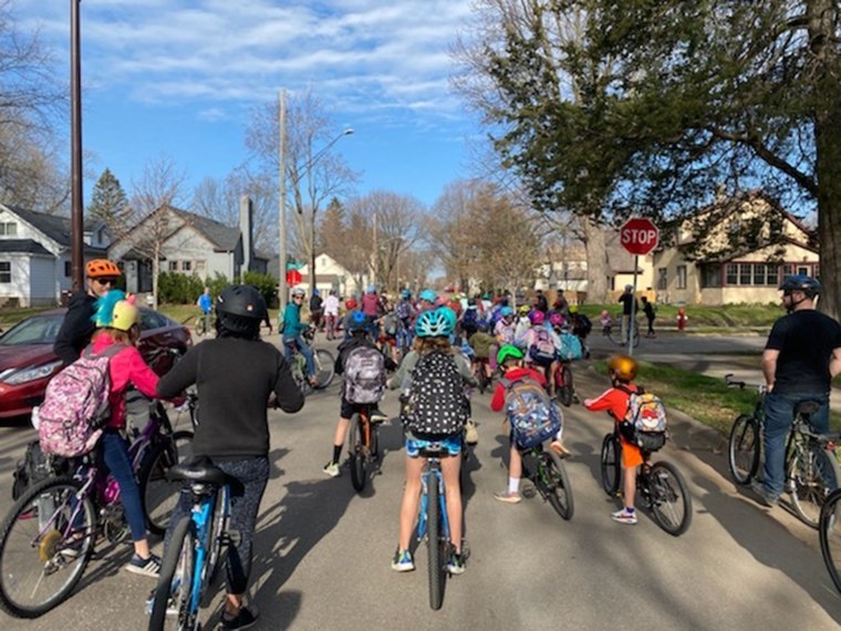 Devin Olson of Minneapolis organized a "bike bus" for the students in his school community.