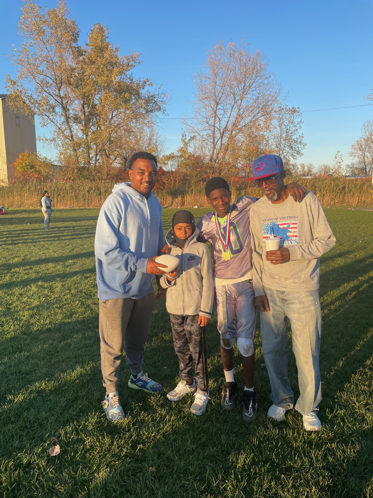 Bryant Brown Jr, Romello "Mello" Early, Melvin Anderson, and Wesley Anderson after Melvin's football game.