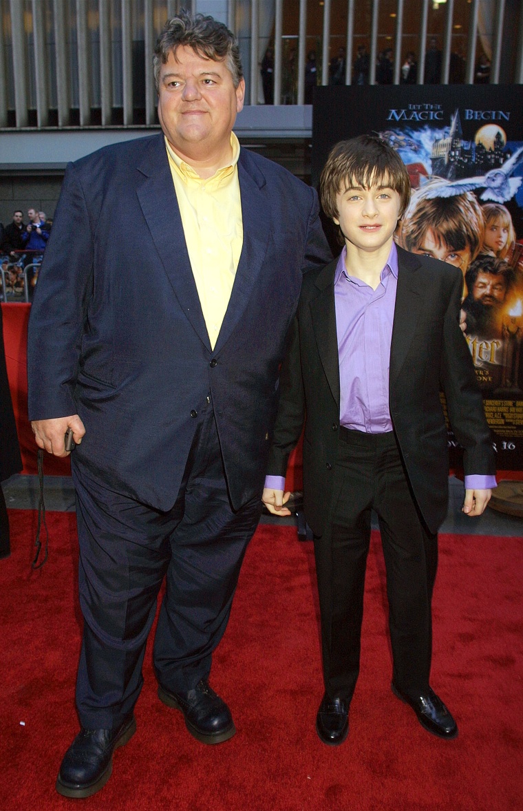 Actor Daniel Radcliffe (R) and Actor Robbie Coltrane attend the premiere of "Harry Potter and the Sorcerer's Stone"
