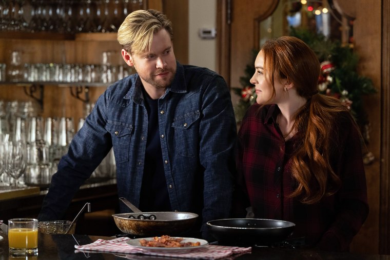 Falling For Christmas. (L to R) Chord Overstreet as Jake, Lindsay Lohan as Sierra in Falling for Christmas.