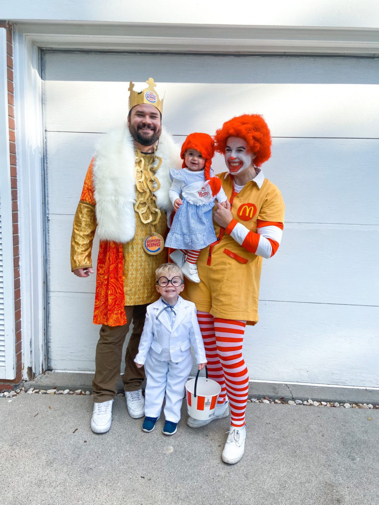 family dressed as burger king, wendys, mcdonalds and KFC for halloween 