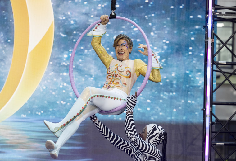 Hoda Kotb and Savannah Guthrie are Cirque Du Soleil acrobats during the TODAY show's Halloween reveal on October 31, 2022.