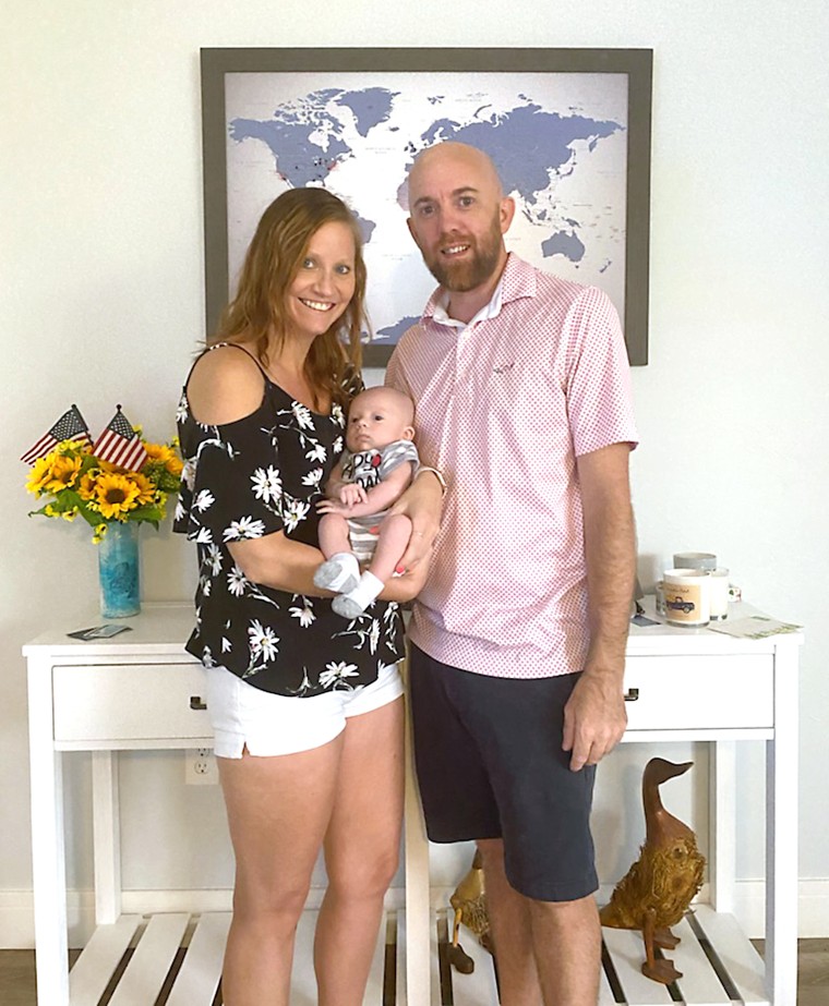Callie Brown and Chad Duckwall escaped their home during Hurricane Ian with their newborn baby and their cat.