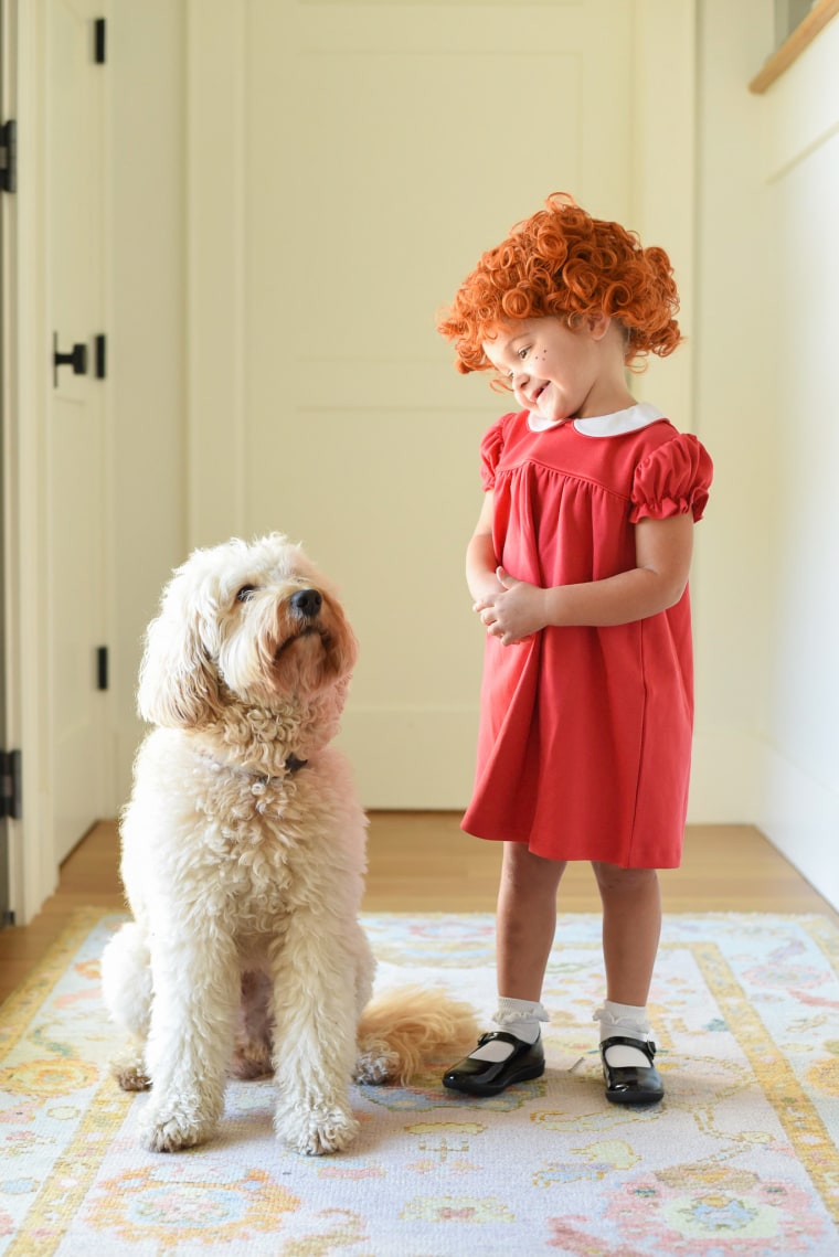 little girl dressed as annie