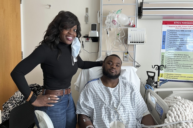 Mike Hollins with his mother, Brenda Hollins, at University of Virginia Medical Center in Charlottesville, Va., on Nov. 17, 2022.