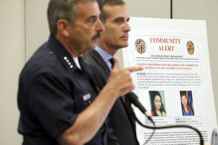 Los Angeles Police Chief Charlie Beck, left, and Mayor Eric Garcetti announce the arrest of a suspect in the 2011 kidnapping and murders of two young women, at police headquarters in downtown Los Angeles Tuesday, May 30, 2017. Geovanni Borjas, 32, was charged with two counts each of murder and forcible rape, and one count of kidnapping in the deaths of 17-year-old Michelle Lozano and 22-year-old Bree'Anna Guzman, the Los Angeles County district attorney's office said. (AP Photo/Reed Saxon)