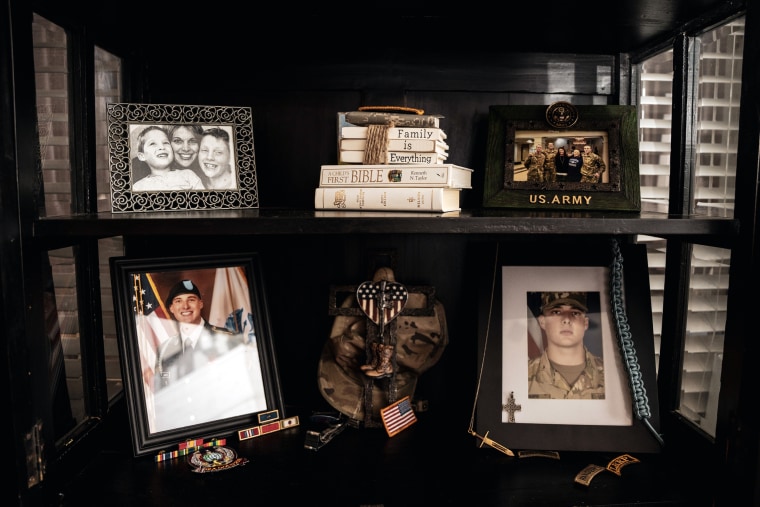 A shelf in Misti Gossett's living room dedicated to her son Joshua Jones, in Hernando, Miss., on Nov. 1, 2022.