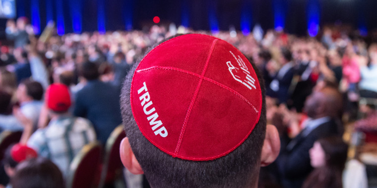 Image: A man wears a Trump yarmulke during the Republican Jewish Coalition 2019.
