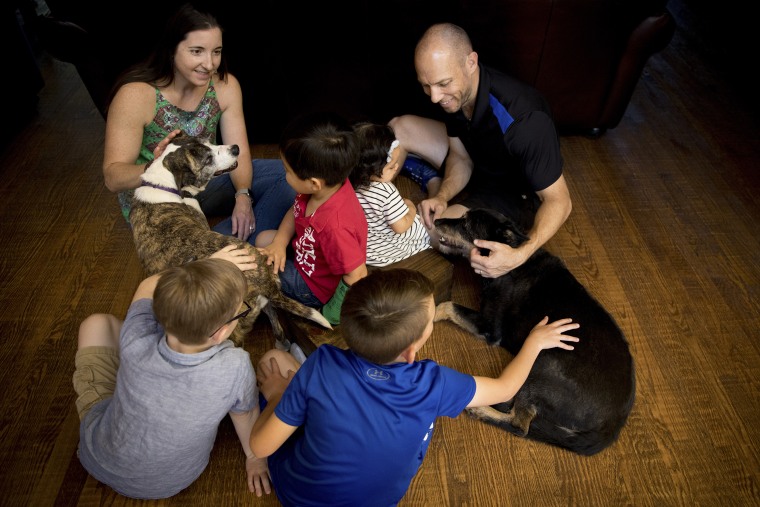 Chad and Jennifer Brackeen with their two biological children and two Native American youths at the center of a court battle, at home near Fort Worth, Texas, on May 31, 2019.