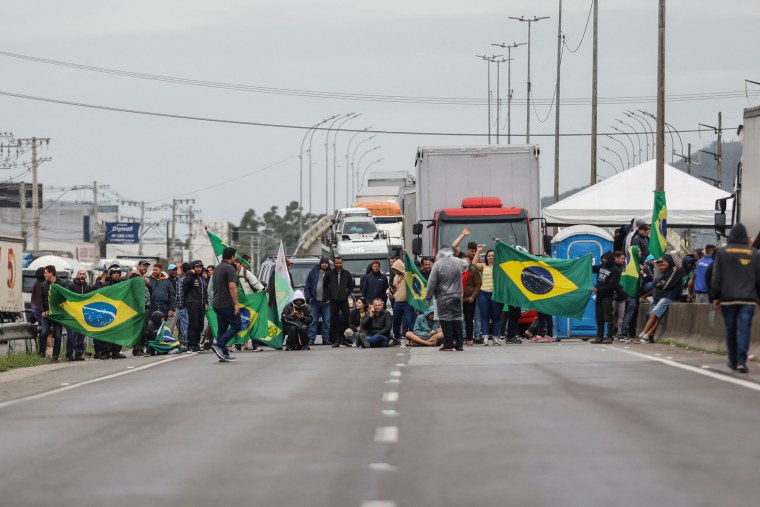 Supporters of President Jair Bolsonaro block the BR-101 highway in Palhoca, Brazil, on Nov. 1, 2022. 