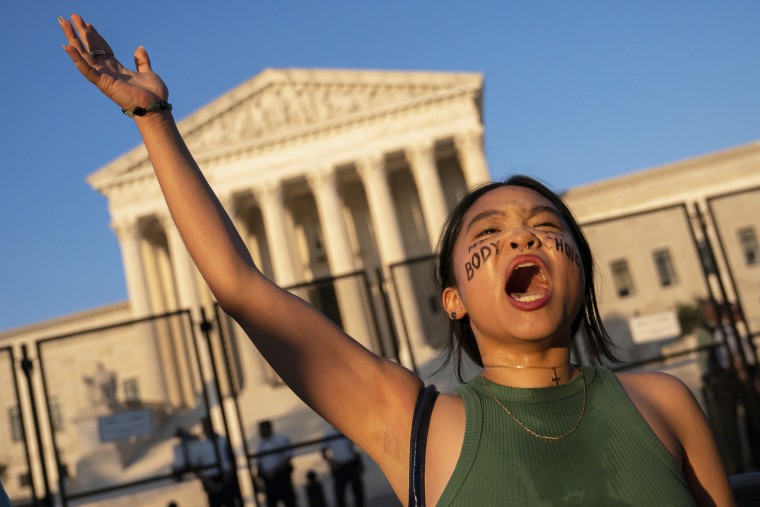 An Abortion rights activist Gwak chants in front of the Supreme Court