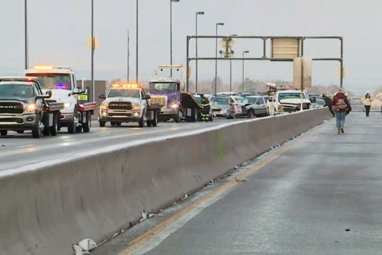 100vehicle crash closes parts of Denver highway following overnight snow