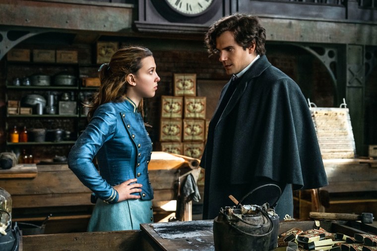 Millie Bobby Brown as Enola Holmes and Henry Cavill as Sherlock Holmes in "Enola Holmes 2."