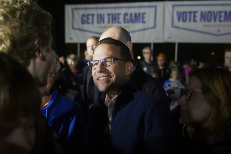 Democratic gubernatorial candidate Josh Shapiro greets supporters at a campaign rally in Pittsburgh, Pa., on Nov. 1, 2022.