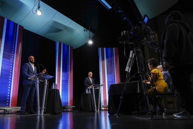 Republican Senate candidate Ron Johnson and Democratic Senate candidate Mandela Barnes participate during a televised debate
