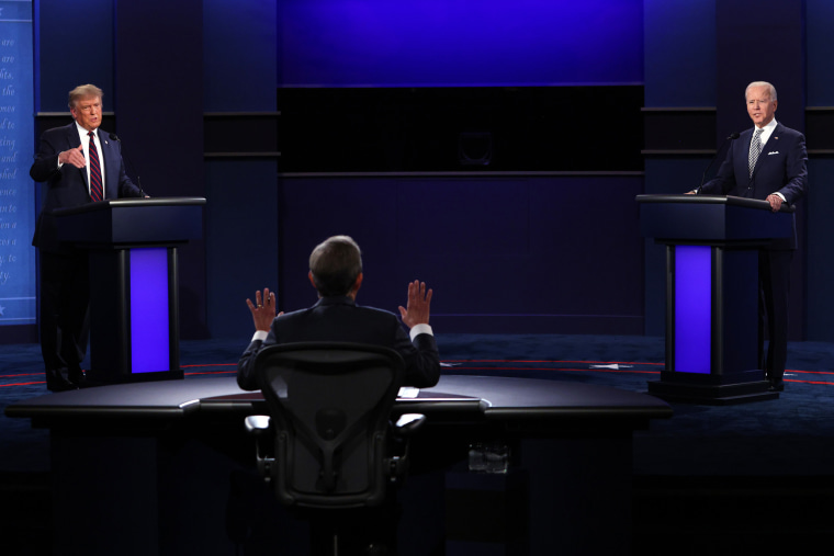 Then-President Donald Trump and Then-Democratic presidential nominee Joe Biden participate in a debate 
