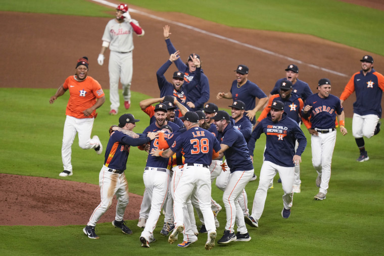 The Houston Astros celebrate their 4-1 World Series win against the Philadelphia Phillies in Game 6 on Saturday in Houston.