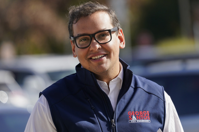 George Santos campaigns in Glen Cove, N.Y. , on Nov. 5, 2022.