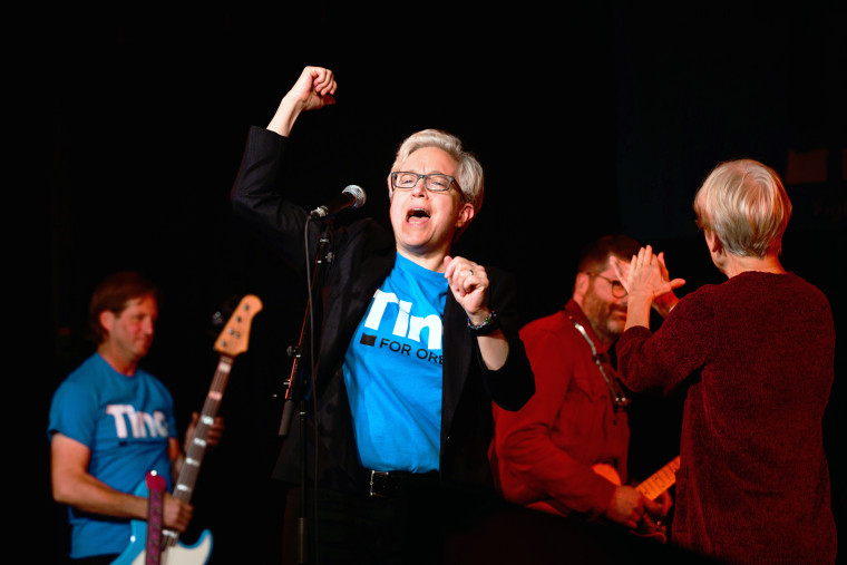 PORTLAND, OR - OCTOBER 22: Democratic gubernatorial Candidate Tina Kotek (Middle Left)) cheers on the crowd during a rally on October 22, 2022 in Portland, Oregon. Kotek was joined by U.S. Senators Elizabeth Warren (D-MA) Jeff Merkley (D-OR) to energize potential voters in a hotly contested gubernatorial race where Republican Candidate Christine Drazan has drawn within striking distance of victory. Oregon has not elected a republican Governor since 1982. (Photo by Mathieu Lewis-Rolland/Getty Images)