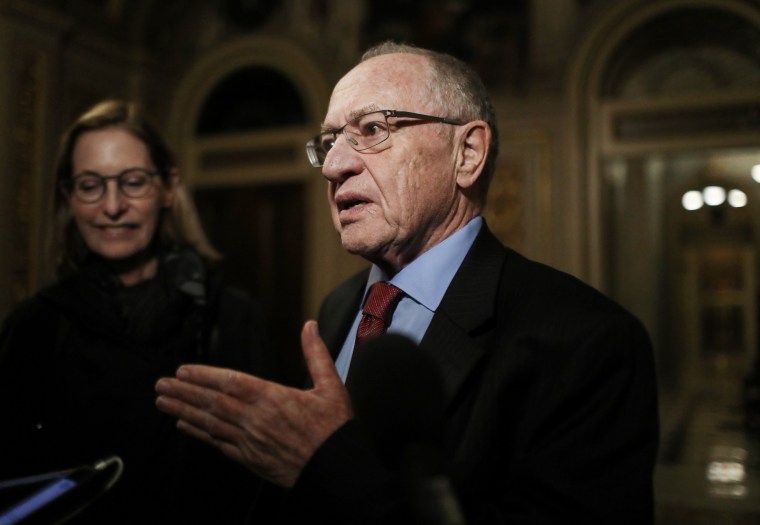 Image: Alan Dershowitz speaks to the press during the Senate impeachment trial at the U.S. Capitol on January 29, 2020 in Washington. 