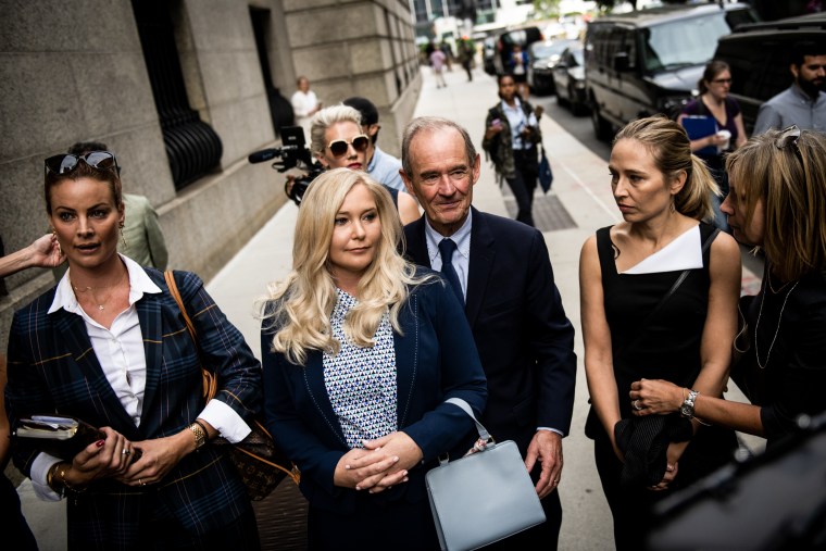 Image: Virginia Giuffre, center, one of Jeffrey Epstein's accusers at federal court in New York on Aug. 27, 2019. 