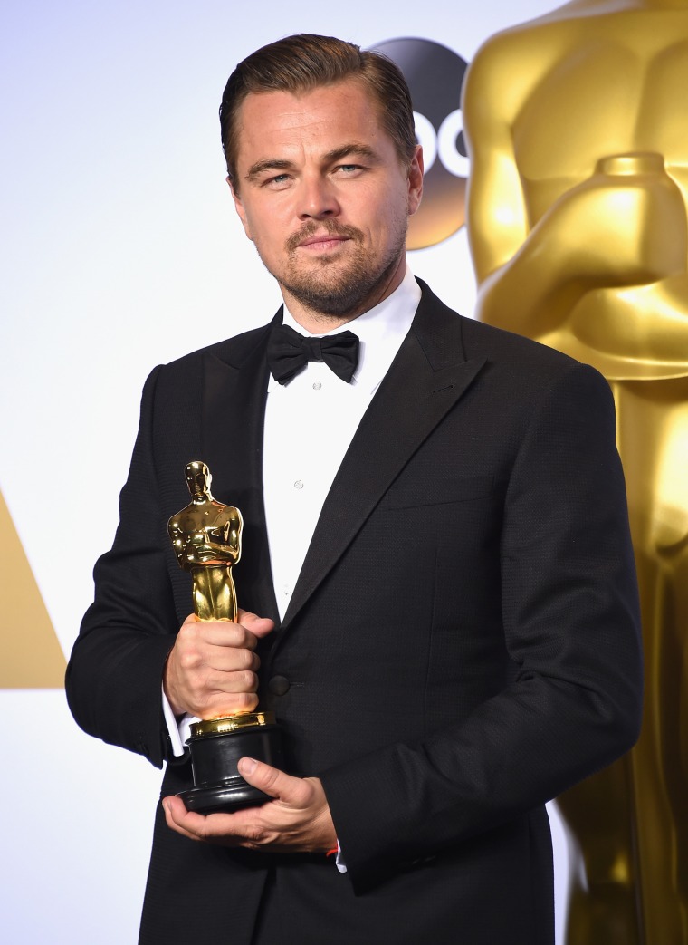 Leonardo DiCaprio poses with his Oscar.