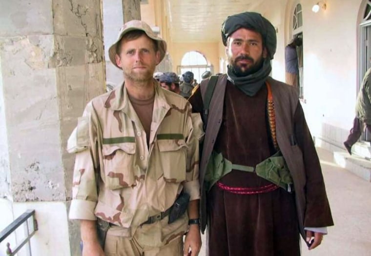 Afghan Commander Mohammed Faqir Jawzjani with Captain Mark Nutsch in Northern Afghanistan