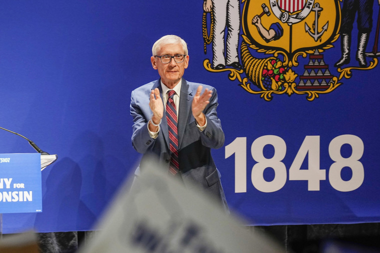 Wisconsin Gov. Tony Evers celebrates victory in Madison on Wednesday. 