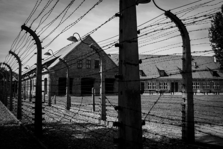 Montana Tucker filming for her how "How to: Never Again" series at Auschwitz Birkenau, a Concentration camp in Oświęcim, Poland.