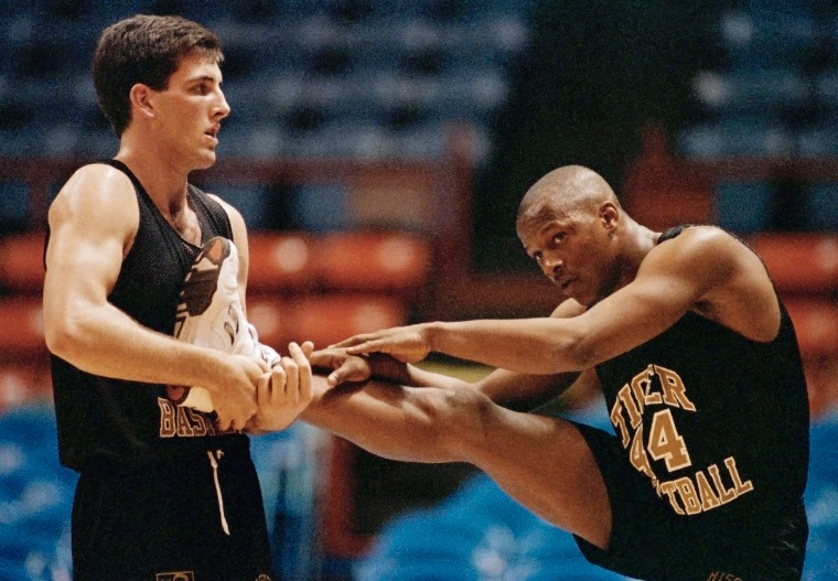 Missouri’s Anthony Peeler, right, gets help from teammate James "Jed" Frost as he prepares for a practice session at the Greensboro Coliseum in Greensboro, N.C., March 18, 1992.