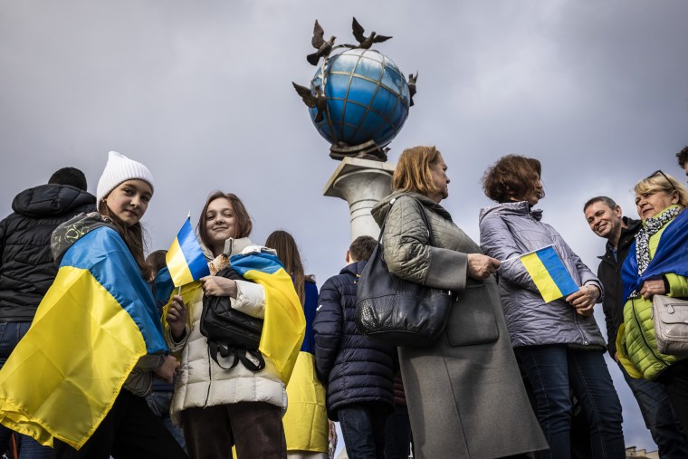 Poeple celebrate after Kherson was liberated in Independence Square on Nov. 12, 2022, in Kyiv, Ukraine.