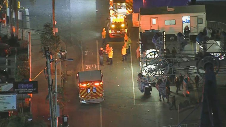 Emergency workers respond to the scene of a crash in Los Angeles on Nov. 12, 2022.