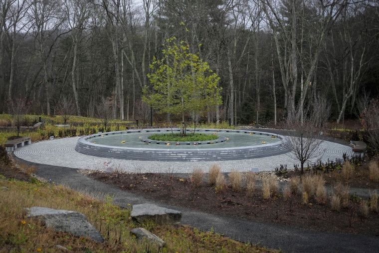 A sycamore tree stands at the center of memorial to the victims of the Sandy Hook Elementary School shooting in Newtown, Conn., on Nov. 13, 2022.