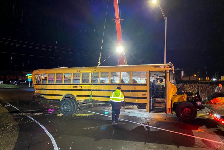 A suspected drunk driver crashed into a school bus carrying  a high school hockey team on Nov. 12, 2022, in Warsaw, Ind.