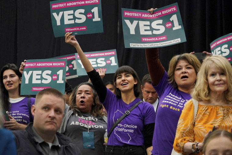 Supporters of the YES on Proposition 1 at a rally at Long Beach City College in Long Beach, Calif., on Nov. 6.