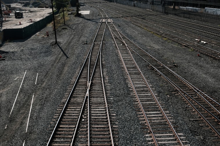 Empty railroad tracks stand at the CSX Oak Point Yard