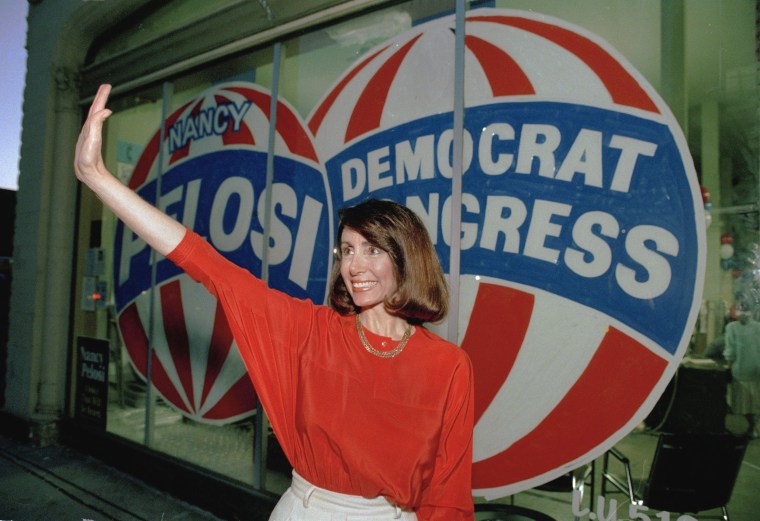 Then-Congressional candidate Nancy Pelosi waves in front of her campaign headquarters in San Francisco in 1987.