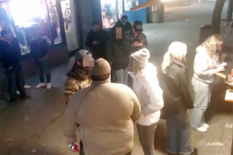 This still from video appears to show two Idaho victims at a food truck before the incident.