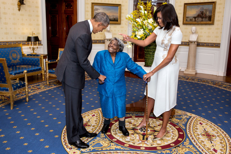 President Barack Obama and First Lady Michelle Obama greet then-106-Year-Old Virginia McLaurin at the White House on Feb. 18, 2016.