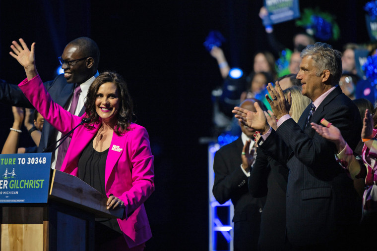 Gov. Gretchen Whitmer and Lt. Gov. Garlin Gilchrist II celebrate on election night in Detroit.