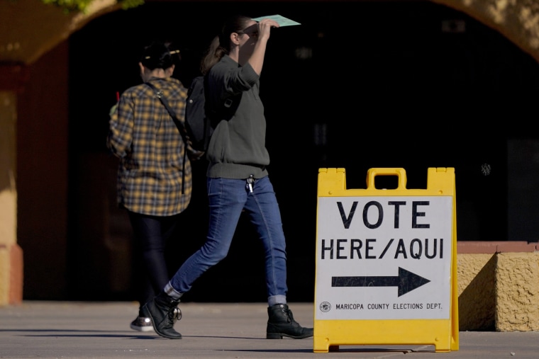 A voter arrives to cast their ballot  in Guadalupe, Ariz., on Nov. 8, 2022.