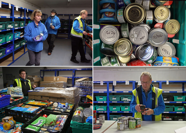 Volunteers at the Morecambe Bay Foodbank pack food donations ready for distribution. 