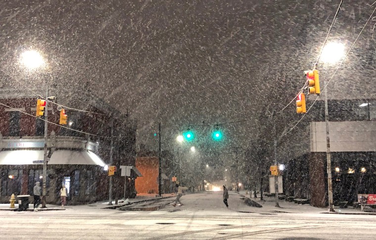 Snow falls in Erie, Pa., on Nov. 16, 2022.