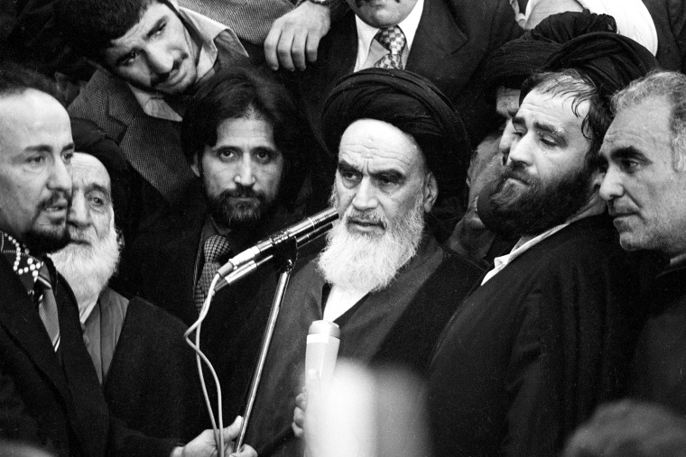 Ayatollah Khomeini addresses an audience in the airport building in Tehran, Iran, Feb. 1, 1979, after his arrival from 14 years of exile. (AP Photo)