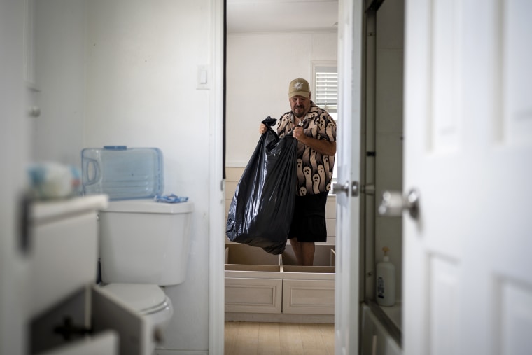 Michael Yost in the bedroom of the damaged home he was renting in Fort Myers Beach, Fla. 