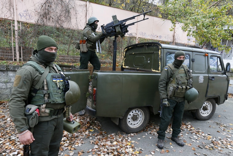 Ukrainian servicemen operate a anti-aircraft machine gun in Mykolaiv, Ukraine, on Nov. 9, 2022.