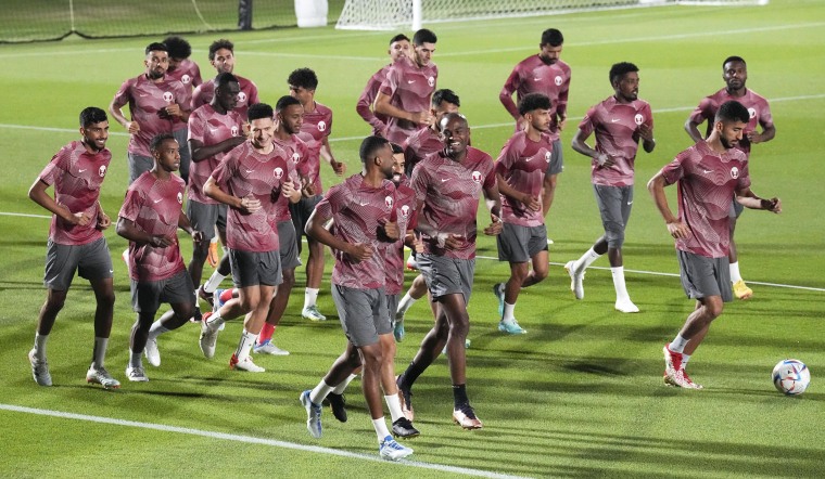 Players exercise during Qatar's official training ahead of the FIFA World Cup