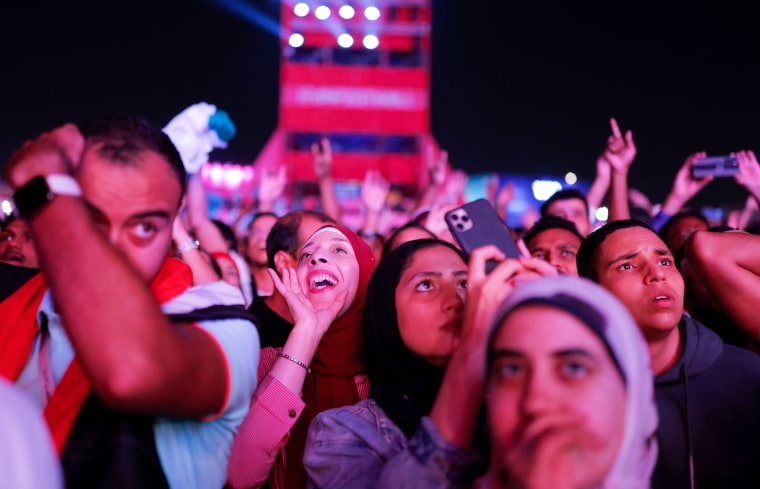 People attend the FIFA Fan Festival opening day ahead of the World Cup