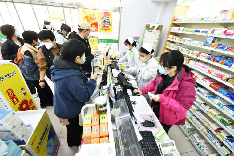 Residents purchase medicine at a pharmacy in Shijiazhuang, Hebei Province of China