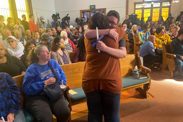 People gather for a vigil at All Saints Church in Colorado Springs, Colo., on Nov. 20, 2022, following a mass shooting at Club Q, a gay nightclub.